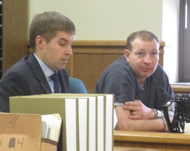 Andrew Obregon (right) and his public defender, Carl Johnson, listen to the proceedings of a preliminary hearing Jan. 21 in Kenosha County Circuit Court. (Photo by Jason Arndt).