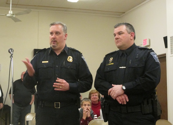 Twin Lakes Police Chief Adam Grosz introduces new lieutenant Josh Cooper, who previously served as Detective for the department, at Monday's Village Board meeting (Photo by Jason Arndt)