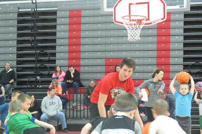 Kevin Brenner, a Panthers' basketball player, was one of about a dozen student-athletes that volunteered their time at Wilmot Union High School's first annual Mighty Mite camp last week (Photo by Jason Arndt).
