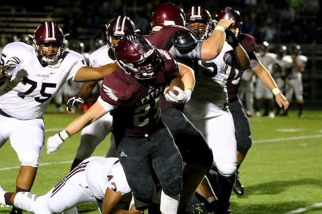 Westosha Central High School's Logan Hughes pushes through a crowd of Zeebee defenders in last Friday's game (Earlene Frederick/The Report).
